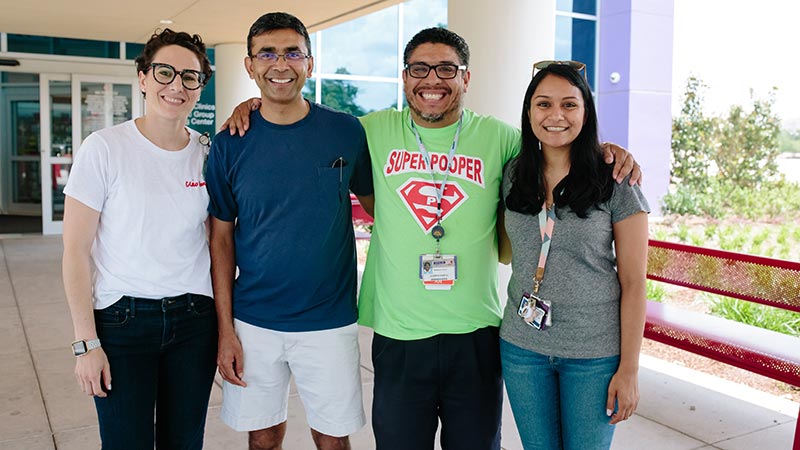 Children's Health IBD Program staff at Camp Oasis. From left, Lily Iteld, Ph.D, Bhaskar Gurram, M.D., Joseph Cantu, R.N., and Megha Mehta, M.D.